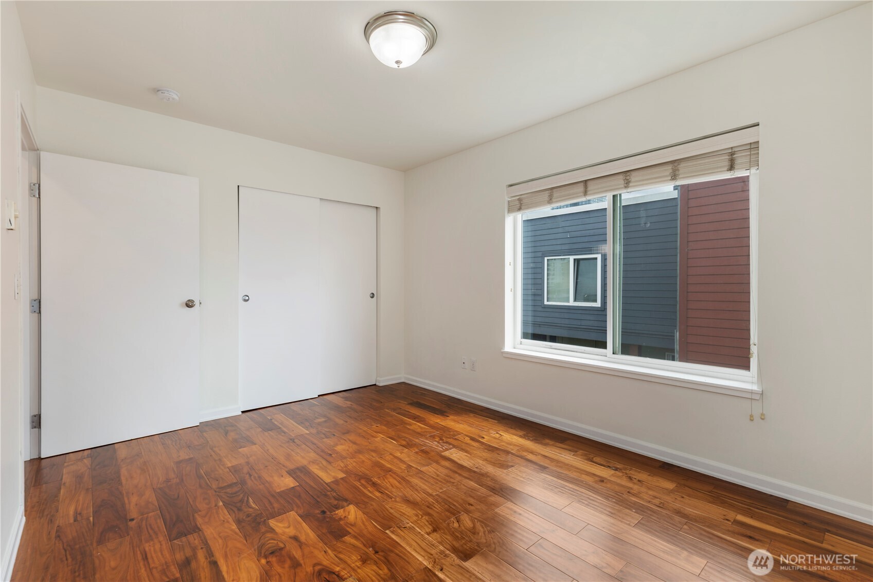 2440 Western Avenue, Unit 807 Seattle, WA 98121 - Photo 22 of 32 an empty room with a window
