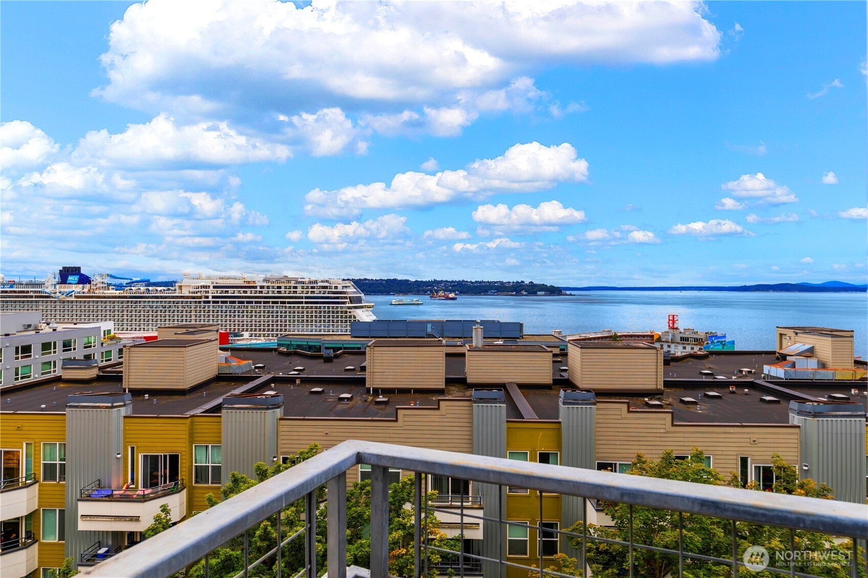 2440 Western Avenue, Unit 807 Seattle, WA 98121 - Photo 29 of 32 a view of a balcony with outdoor seating