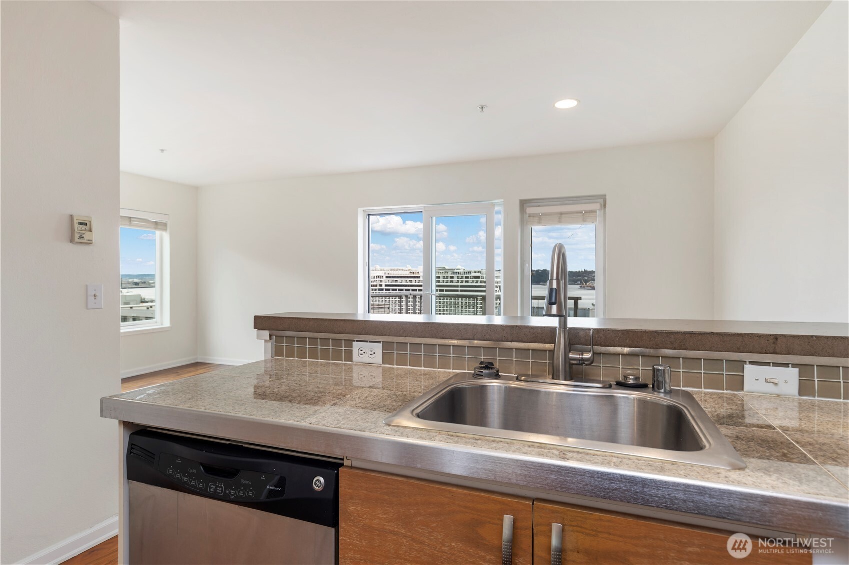 2440 Western Avenue, Unit 807 Seattle, WA 98121 - Photo 9 of 32 a view with a sink and a window