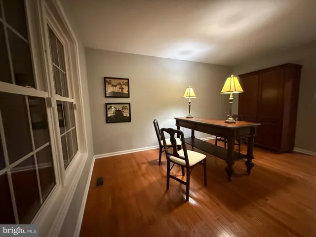 a bathroom with a sink mirror toilet and bathtub