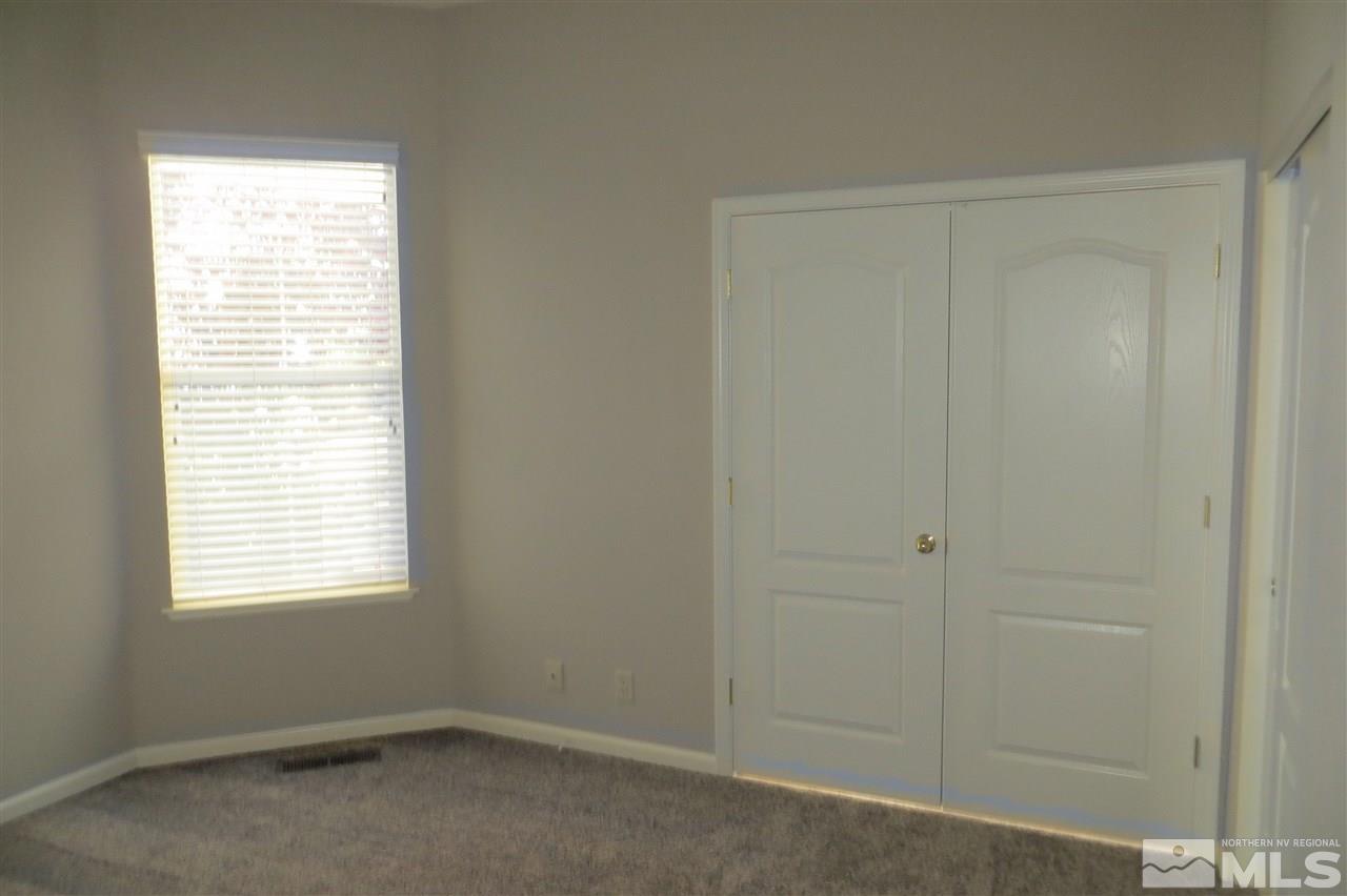 10092 Cascade Falls Drive Reno, NV 89521 - Photo 8 of 22 a small space with a window