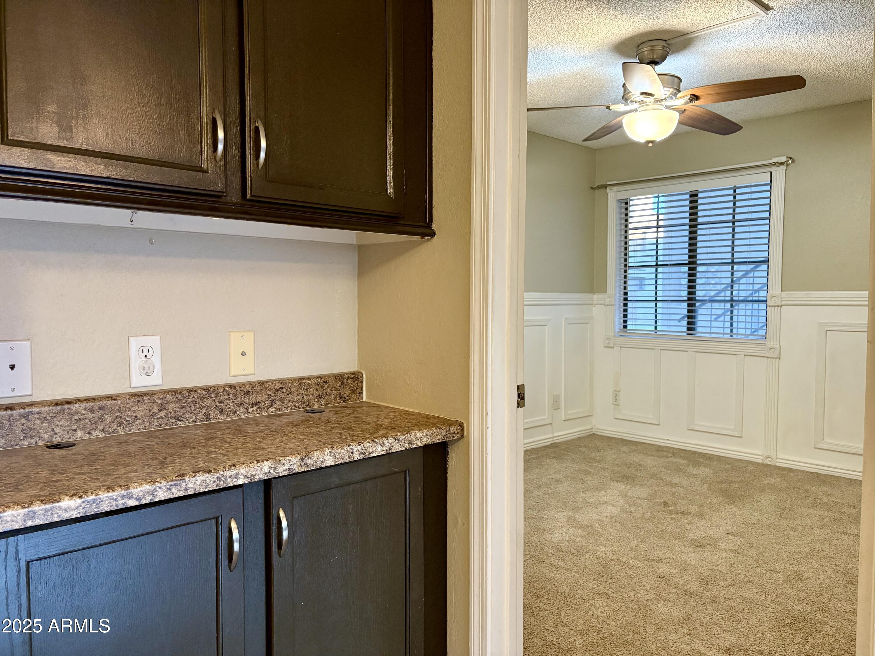 533 West Guadalupe Road, Unit 1122 Mesa, AZ 85210 - Photo 5 of 24 a view of a kitchen with marble kitchen and cabinet