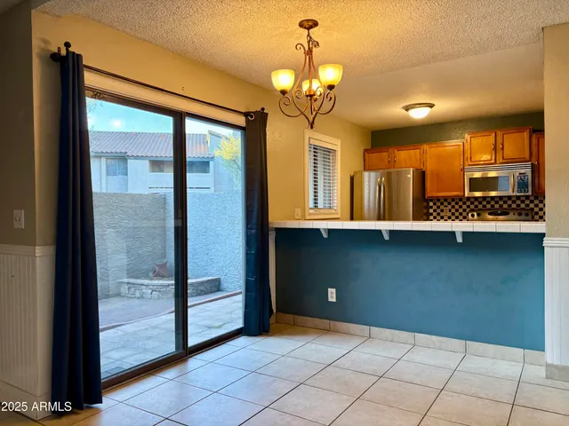 a view of a room with a large window