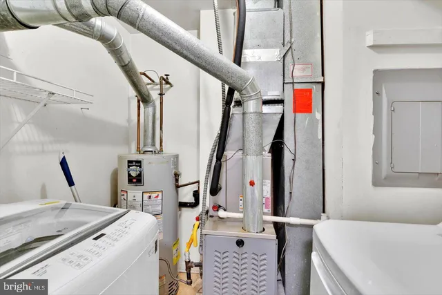 a view of a livingroom with furniture and stairs