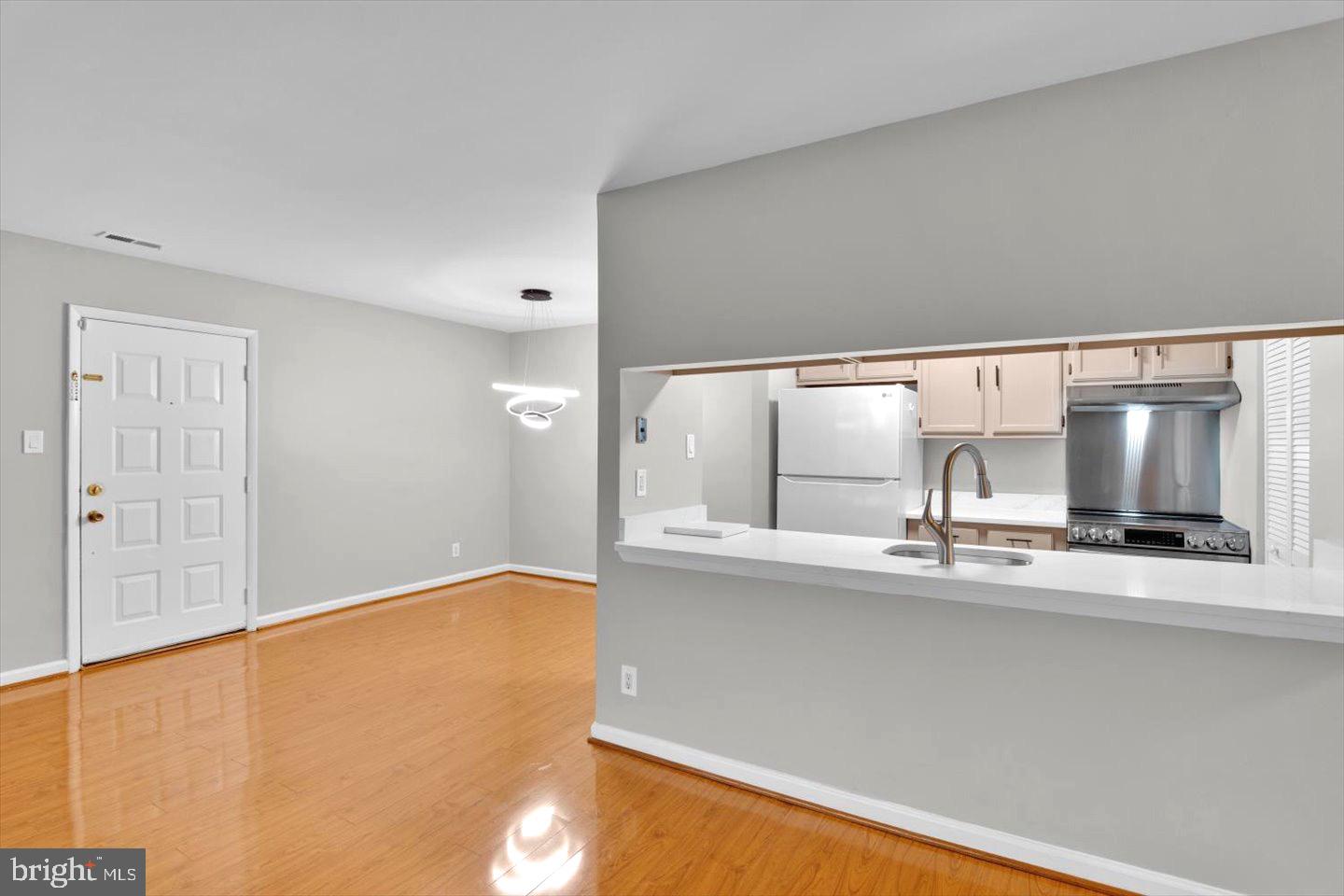 1966 The Woods II Cherry Hill, NJ 08003 - Photo 19 of 33 a kitchen with stainless steel appliances a sink and a cabinets