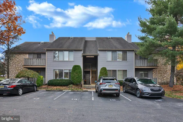 a car parked in front of a house