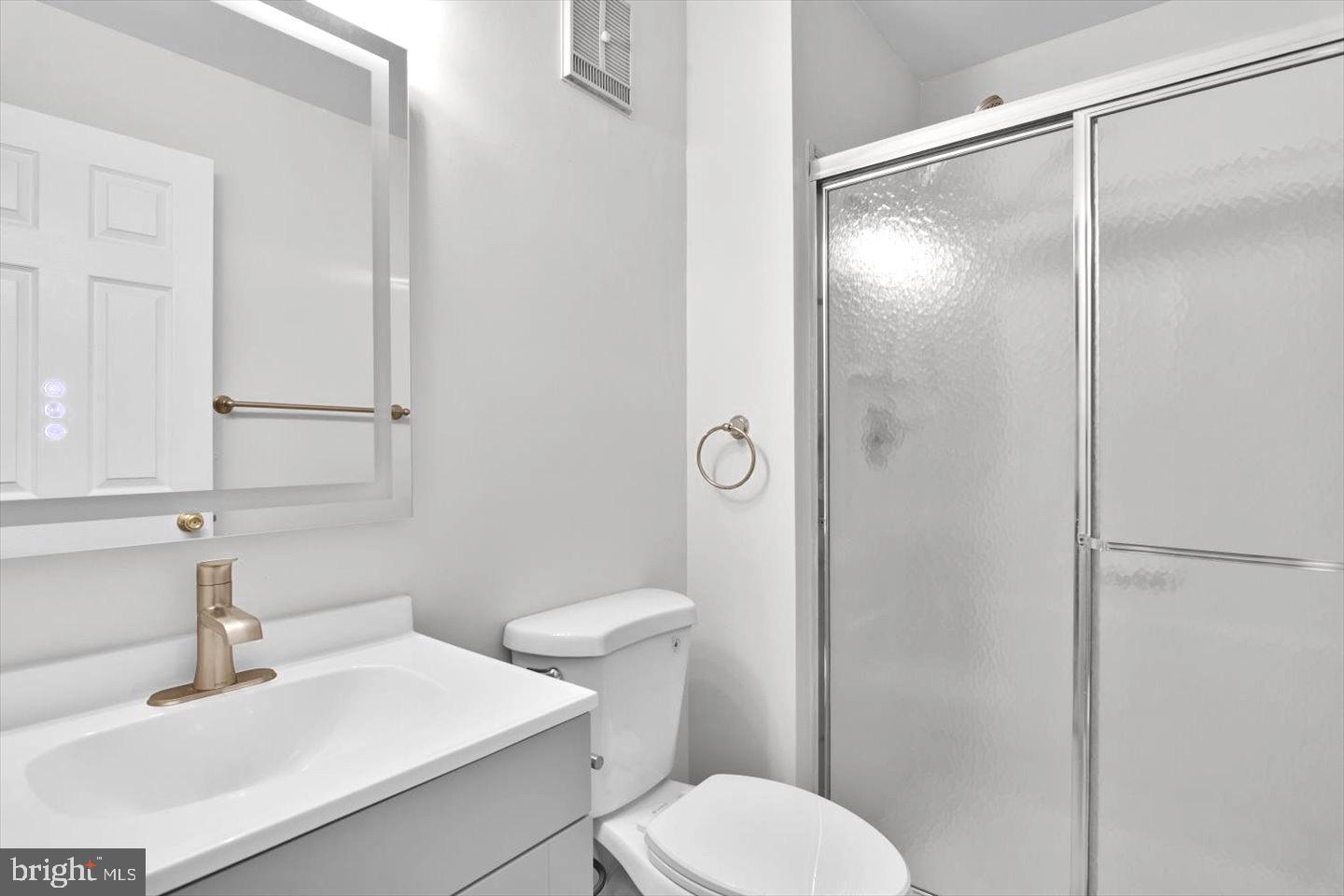 1966 The Woods II Cherry Hill, NJ 08003 - Photo 30 of 33 a bathroom with a sink toilet and shower