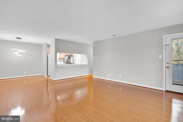 a view of an empty room and window