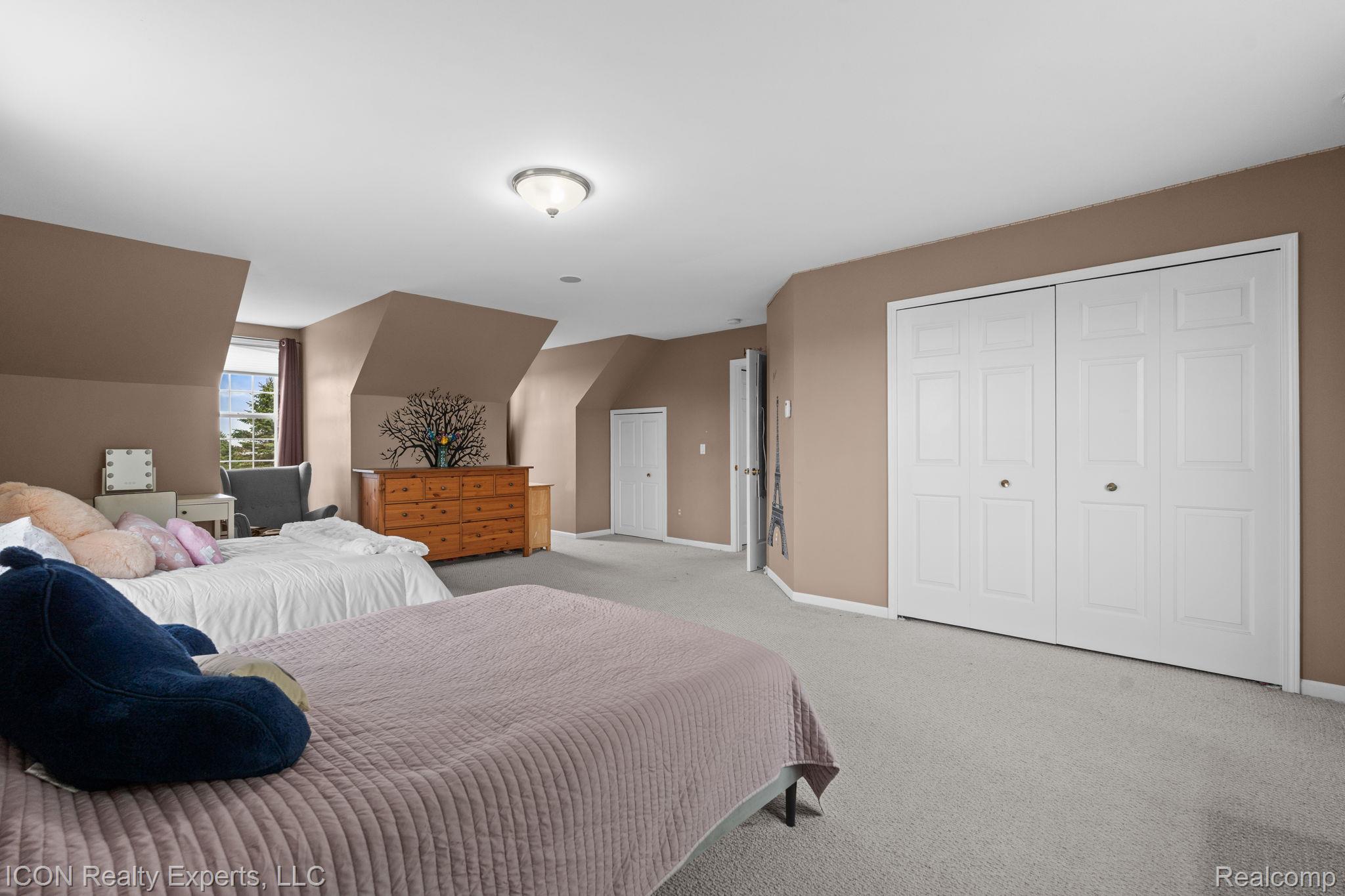 5128 Baldwin Road Metamora, MI 48455 - Photo 39 of 68 Bedroom with light carpet and a closet
