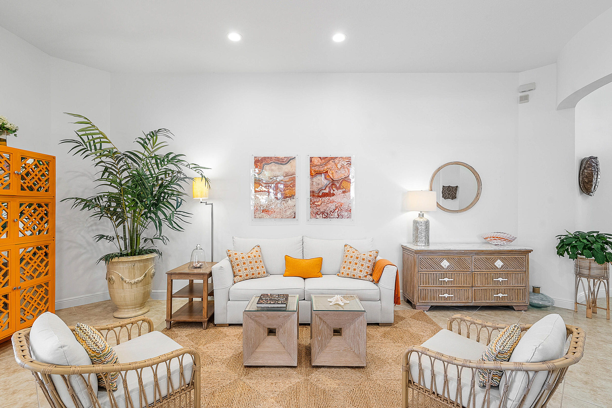 9666 Via Elegante Wellington, FL 33411 - Photo 1 of 37 a living room with furniture and a potted plant