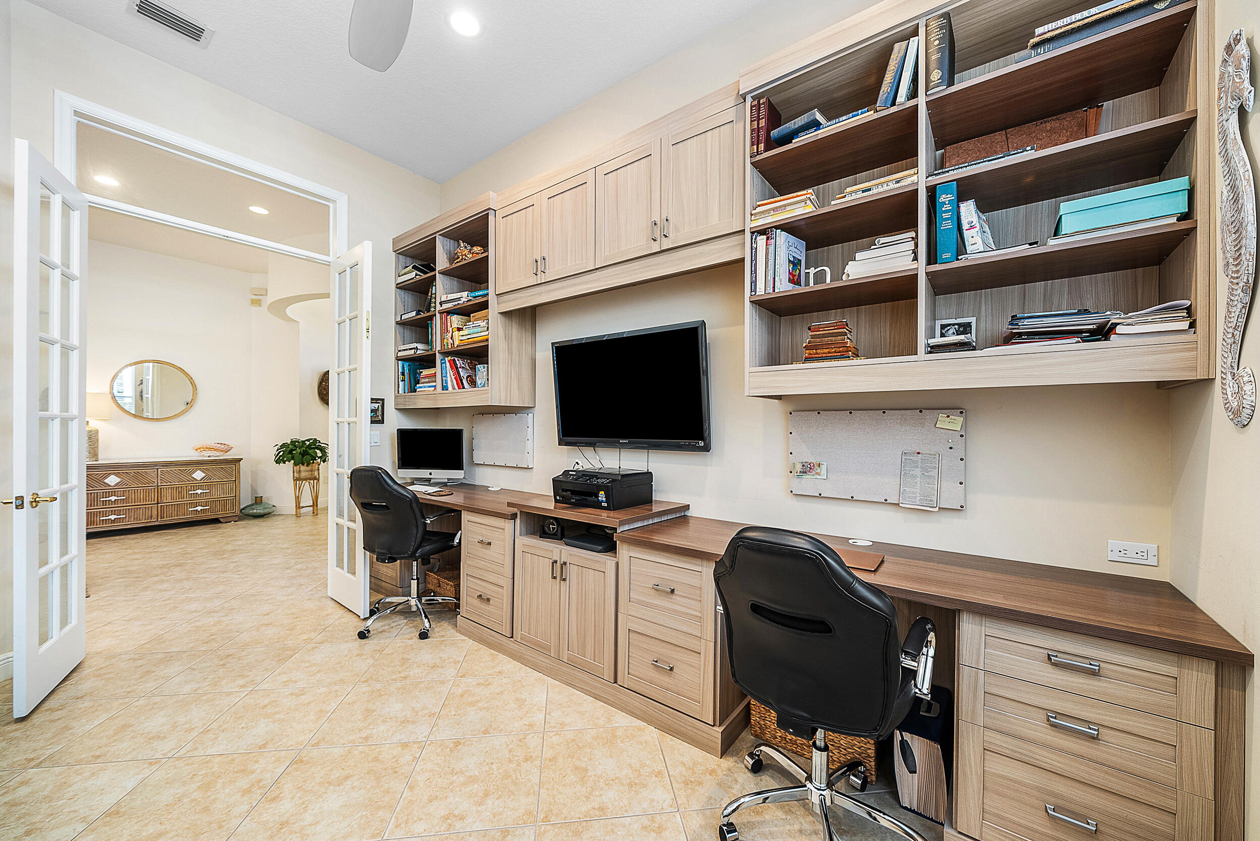 9666 Via Elegante Wellington, FL 33411 - Photo 16 of 37 a view of a workspace with furniture