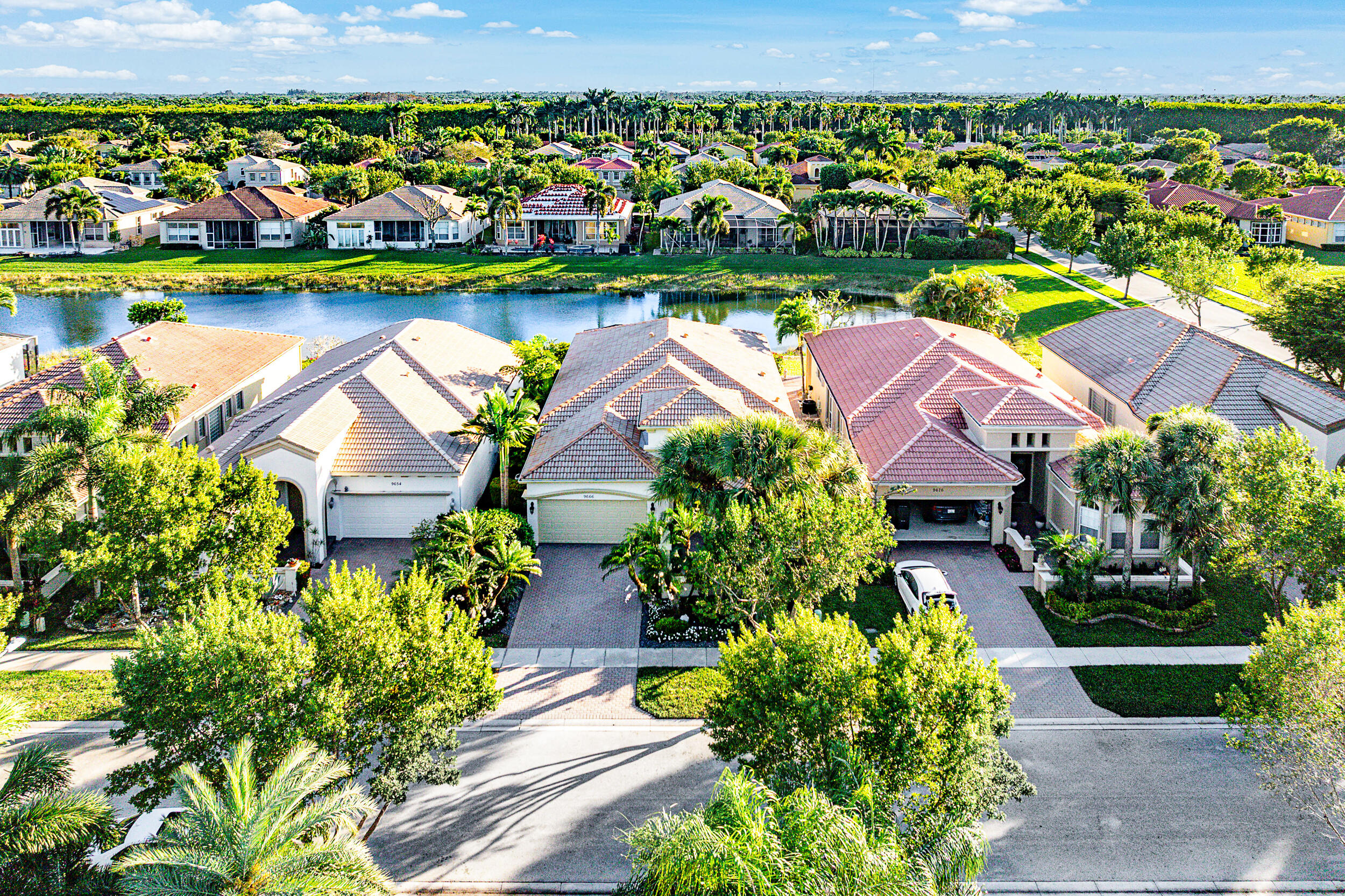 9666 Via Elegante Wellington, FL 33411 - Photo 25 of 37 a view of a lake with houses