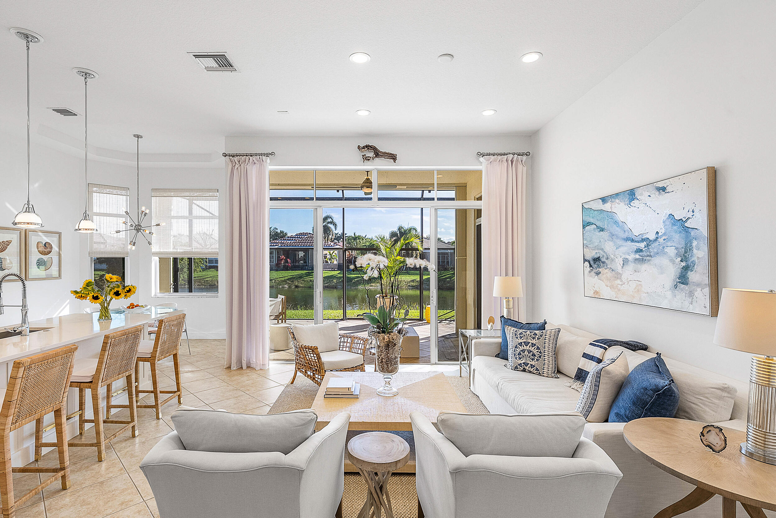 9666 Via Elegante Wellington, FL 33411 - Photo 9 of 37 a living room with furniture and a large window
