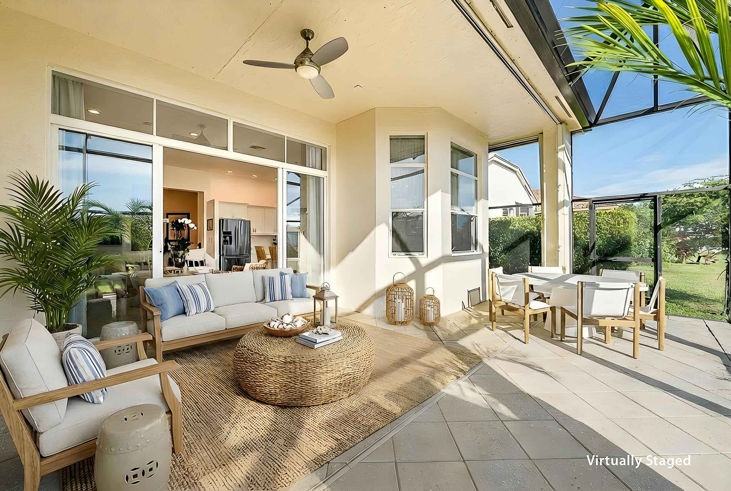 9666 Via Elegante Wellington, FL 33411 - Photo 10 of 37 a living room with furniture and a large window