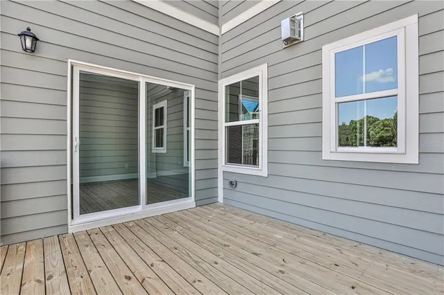 a view of a house with a large window