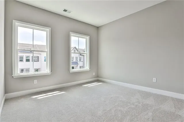 an empty room with windows