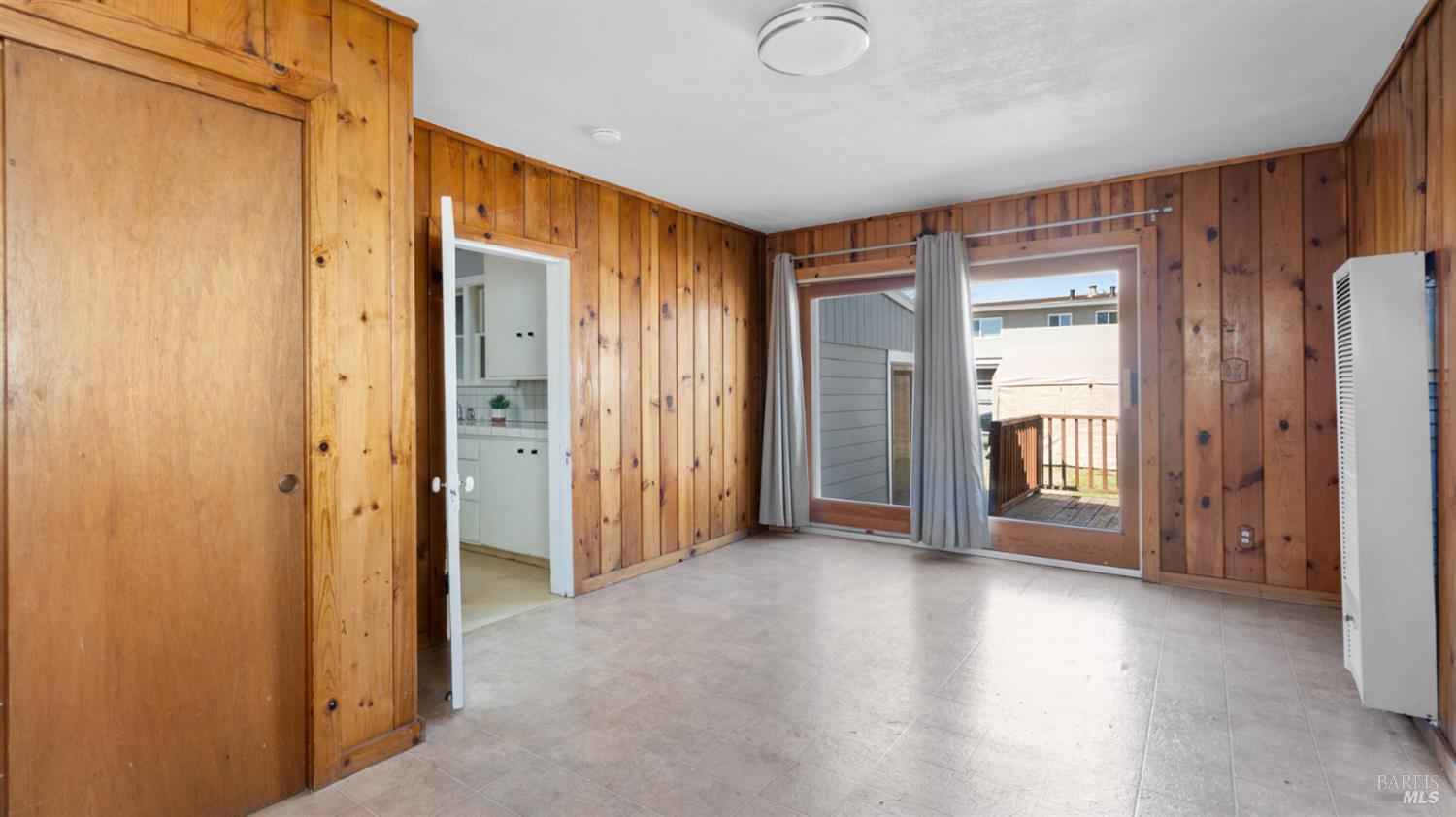 125 Kendal Street Vacaville, CA 95688 - Photo 29 of 45 a view of a hallway with wooden shelves