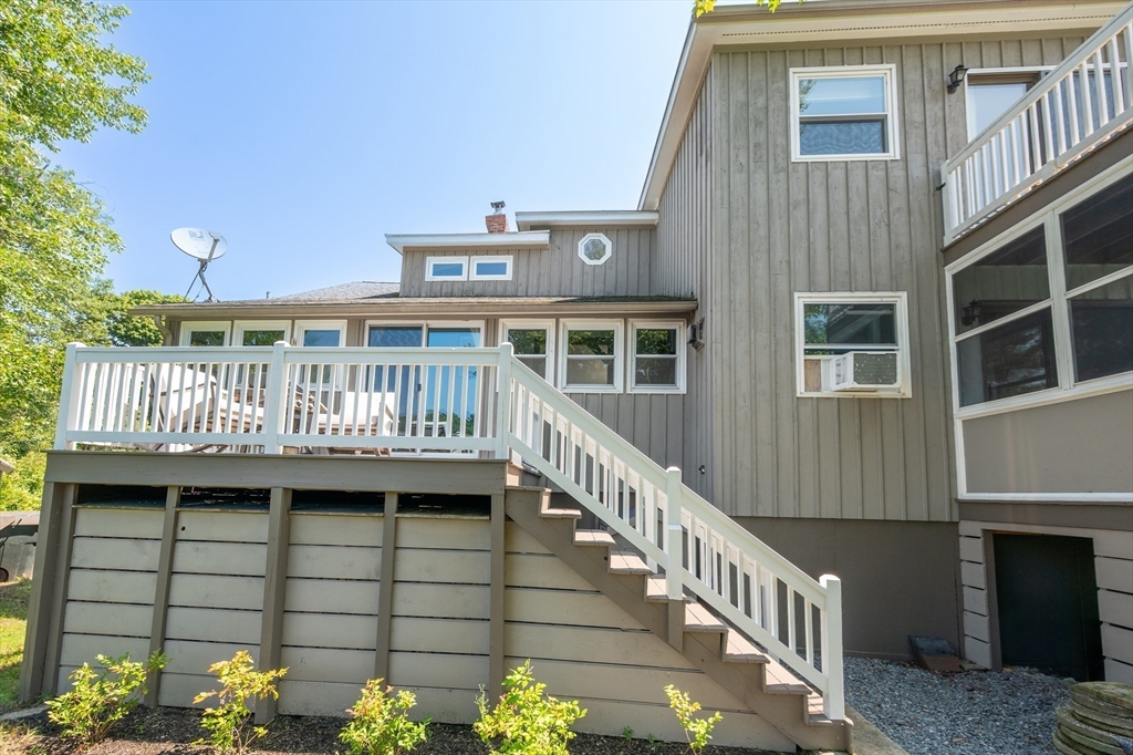 63 River Street Andover, MA 01810 - Photo 13 of 40 a view of a wooden deck