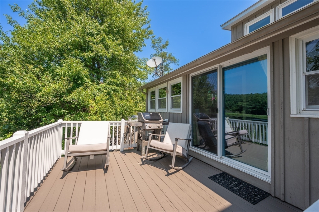 63 River Street Andover, MA 01810 - Photo 15 of 40 a view of roof deck with furniture and garden