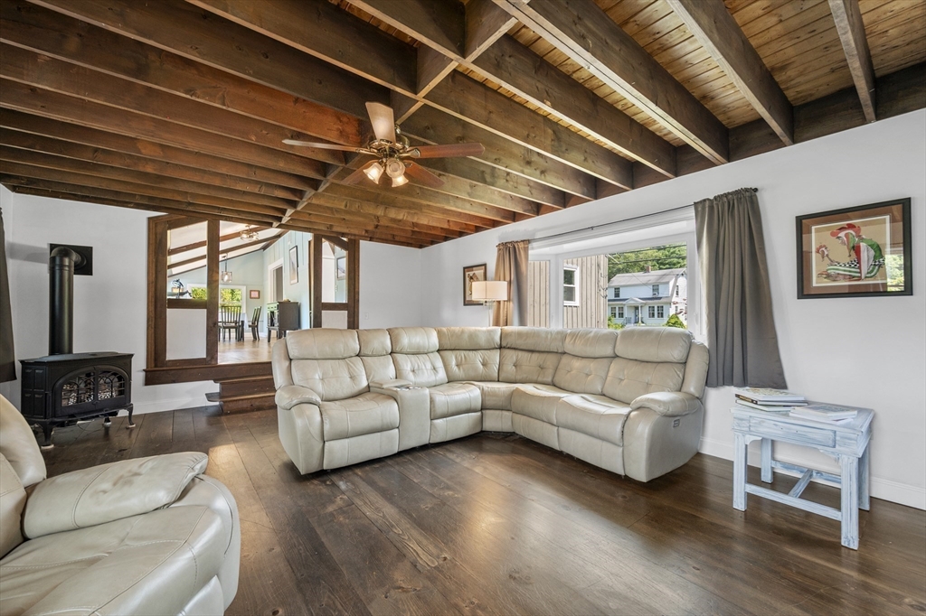 63 River Street Andover, MA 01810 - Photo 18 of 40 a living room with furniture and a large window