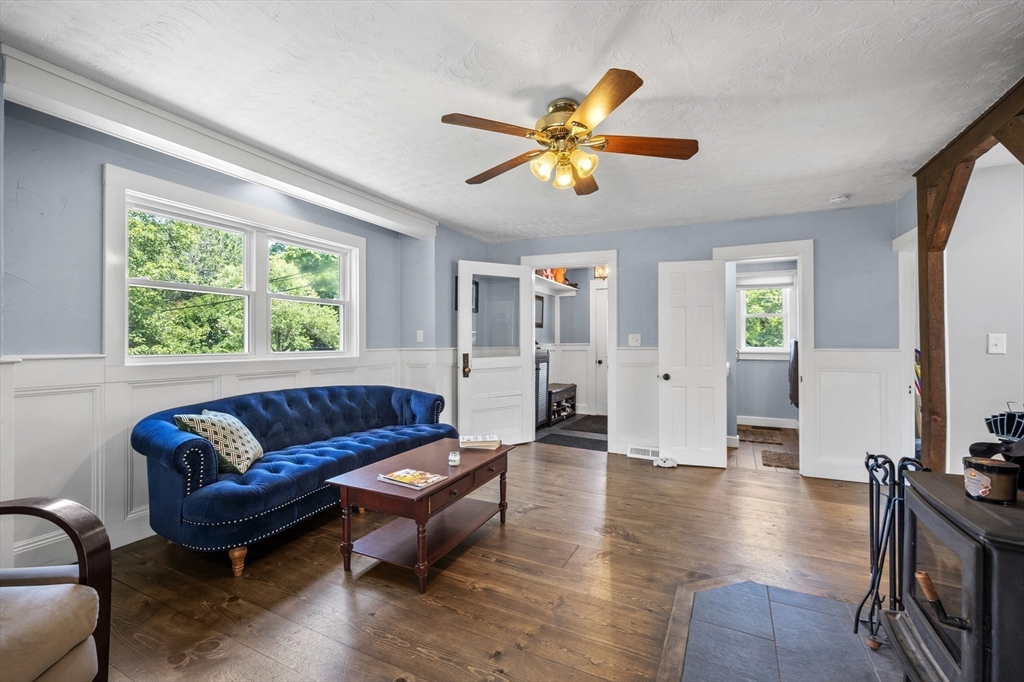 63 River Street Andover, MA 01810 - Photo 25 of 40 a living room with furniture and a large window