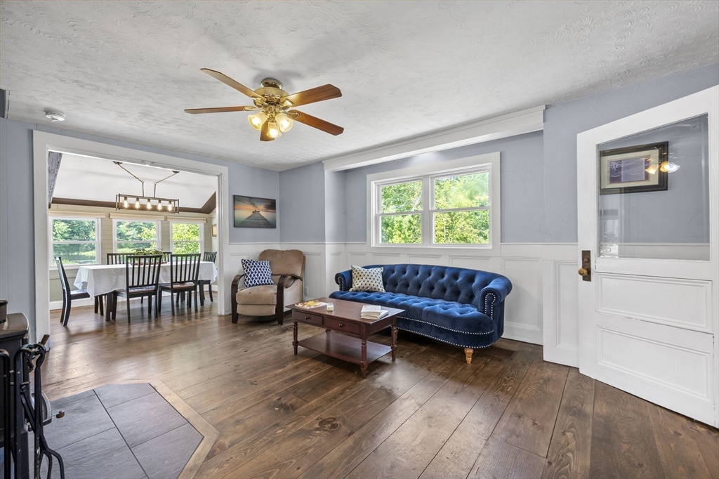 63 River Street Andover, MA 01810 - Photo 26 of 40 a living room with furniture and a window