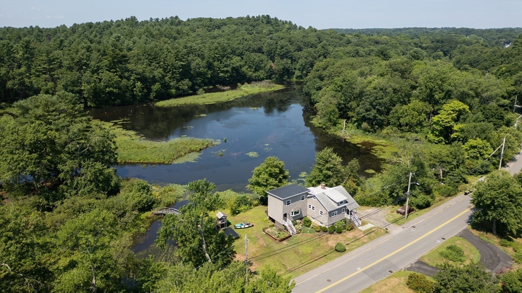 63 River Street Andover, MA 01810 - Photo 3 of 40 an aerial view of a house with a yard