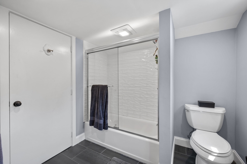 63 River Street Andover, MA 01810 - Photo 34 of 40 a bathroom with a toilet and a shower