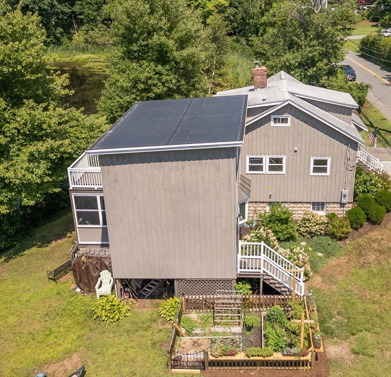 63 River Street Andover, MA 01810 - Photo 40 of 40 a aerial view of a house with a yard