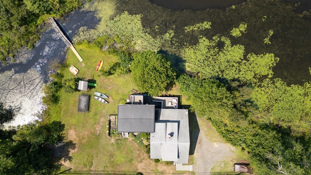 63 River Street Andover, MA 01810 - Photo 4 of 40 view of a house with a yard