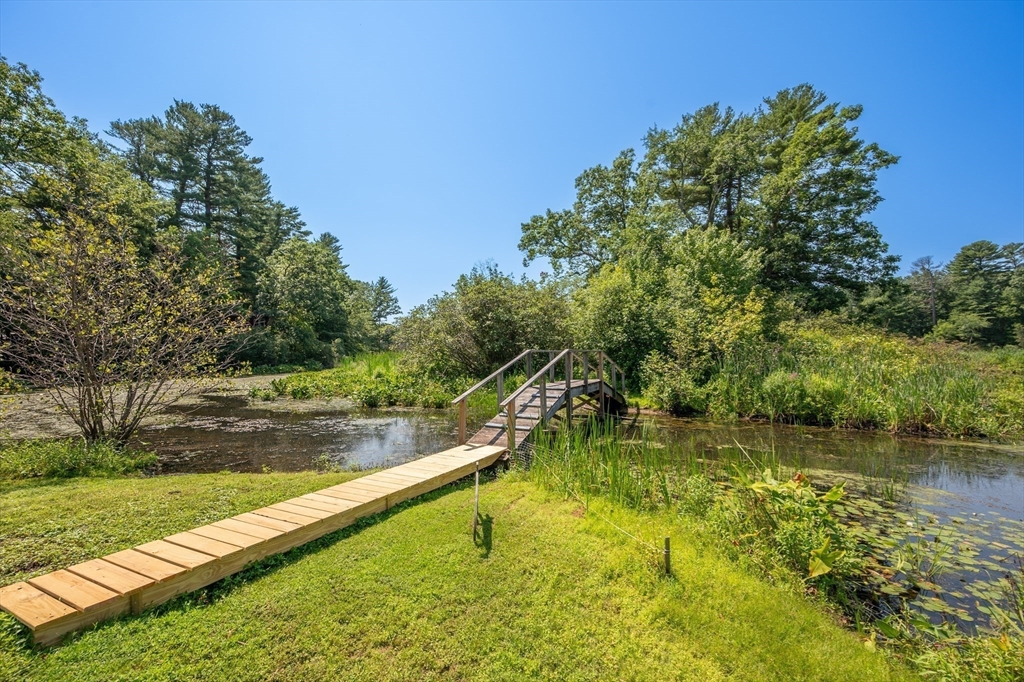 63 River Street Andover, MA 01810 - Photo 5 of 40 a view of a lake with large trees