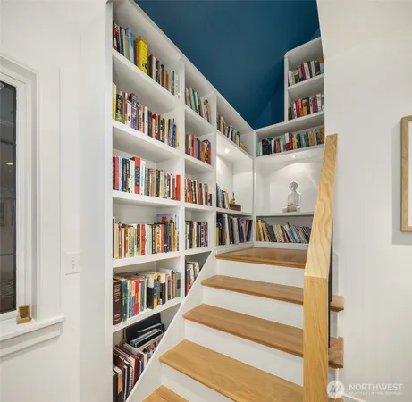 a view of staircase with white walls