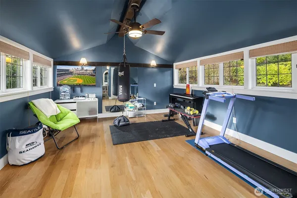 a living room filled with furniture and a chandelier