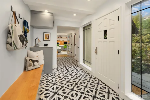 a living room with furniture and a rug