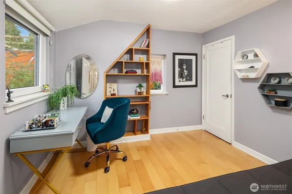 a workspace with furniture and window