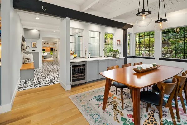 a view of a dining room with furniture and window