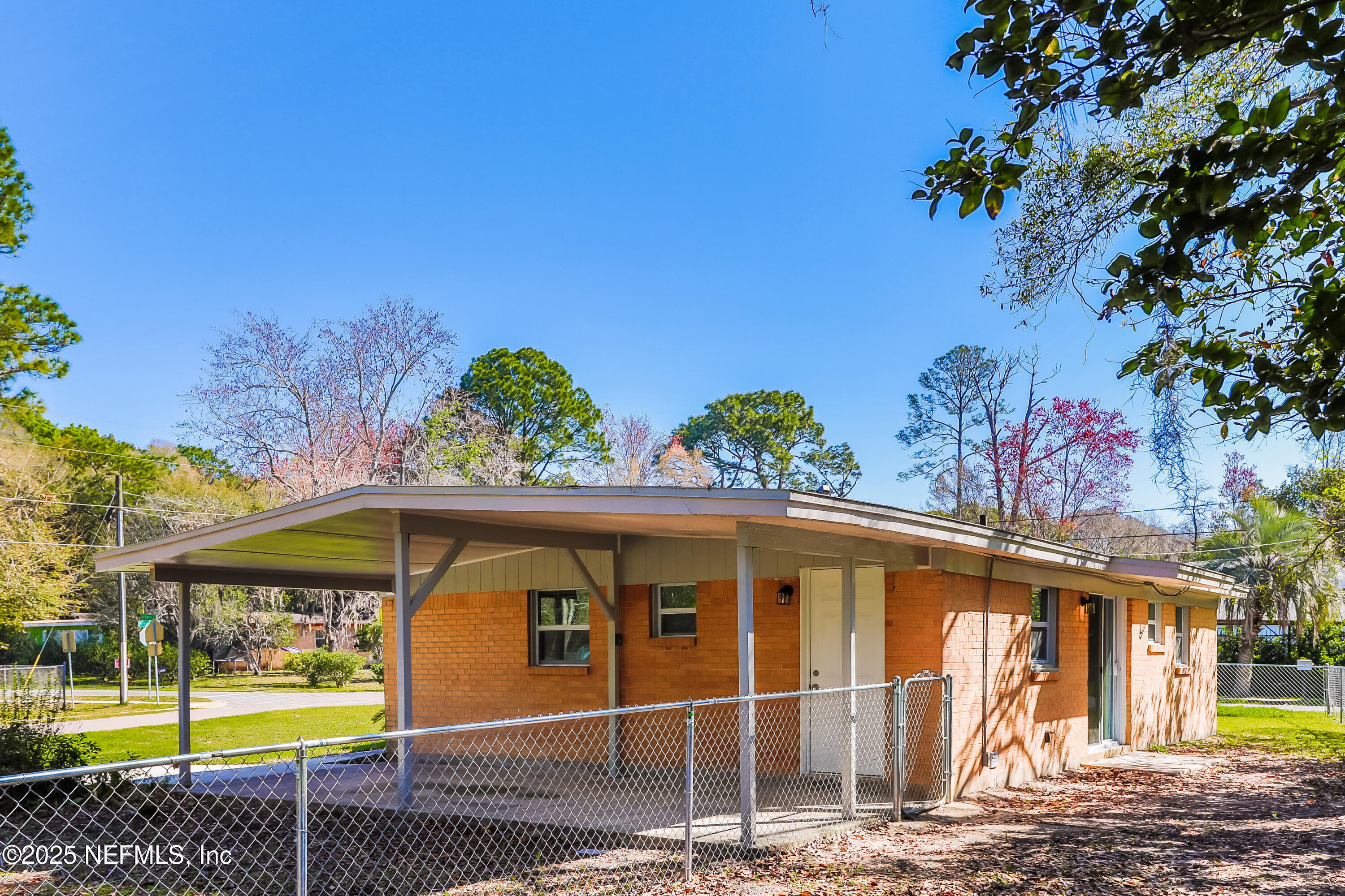 9246 Spottswood Road Jacksonville, FL 32208 - Photo 14 of 15 a front view of a house