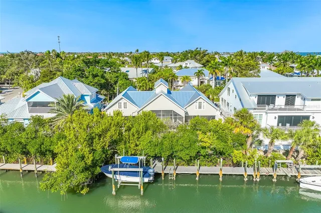 an aerial view of a house with a garden