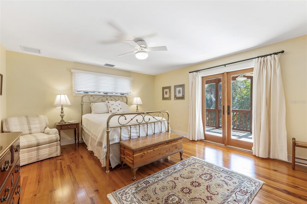 160 1st Street East Boca Grande, FL 33921 - Photo 13 of 43 a bed room with a bed and a window