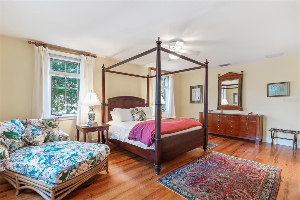 160 1st Street East Boca Grande, FL 33921 - Photo 17 of 43 a bedroom with bed and wooden floor