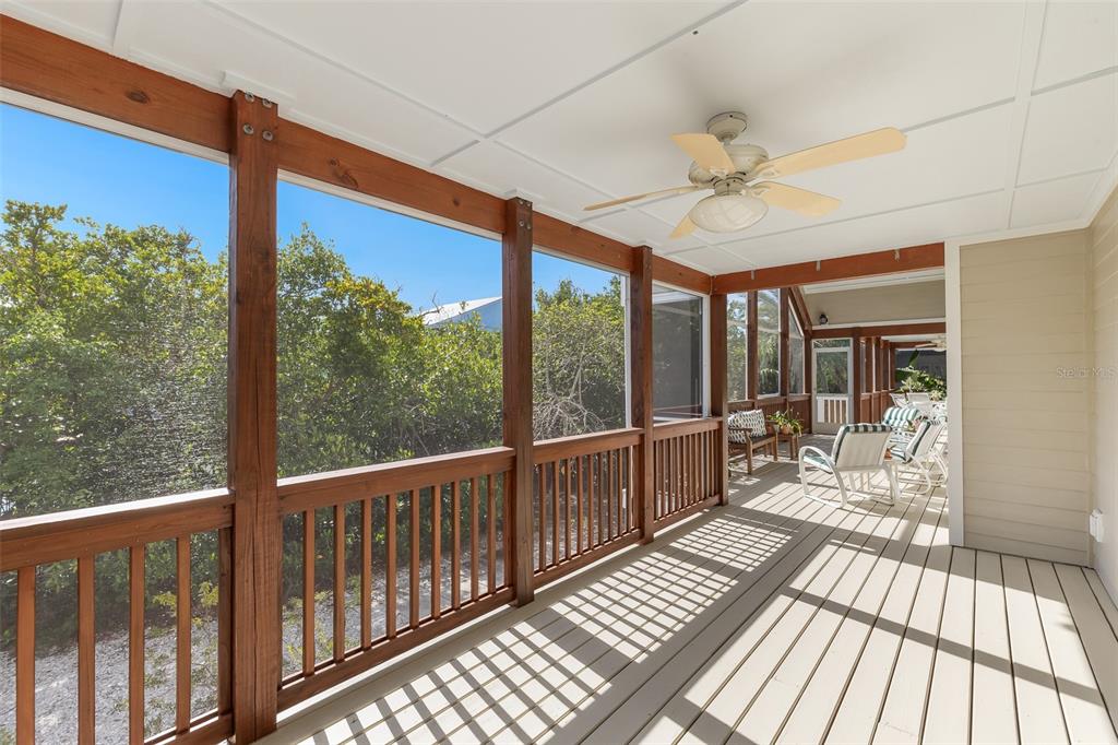 160 1st Street East Boca Grande, FL 33921 - Photo 34 of 43 a view of a balcony with wooden floor