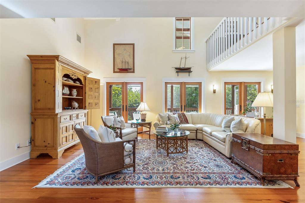 160 1st Street East Boca Grande, FL 33921 - Photo 6 of 43 a living room with furniture windows and wooden floor