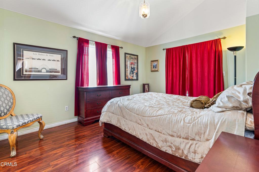 907 West Mission Road, Unit B Alhambra, CA 91801 - Photo 17 of 27 a bed sitting in a bedroom next to a window