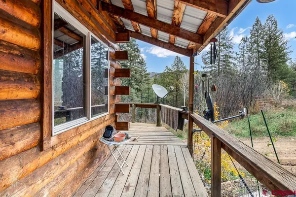 a balcony with wooden floor