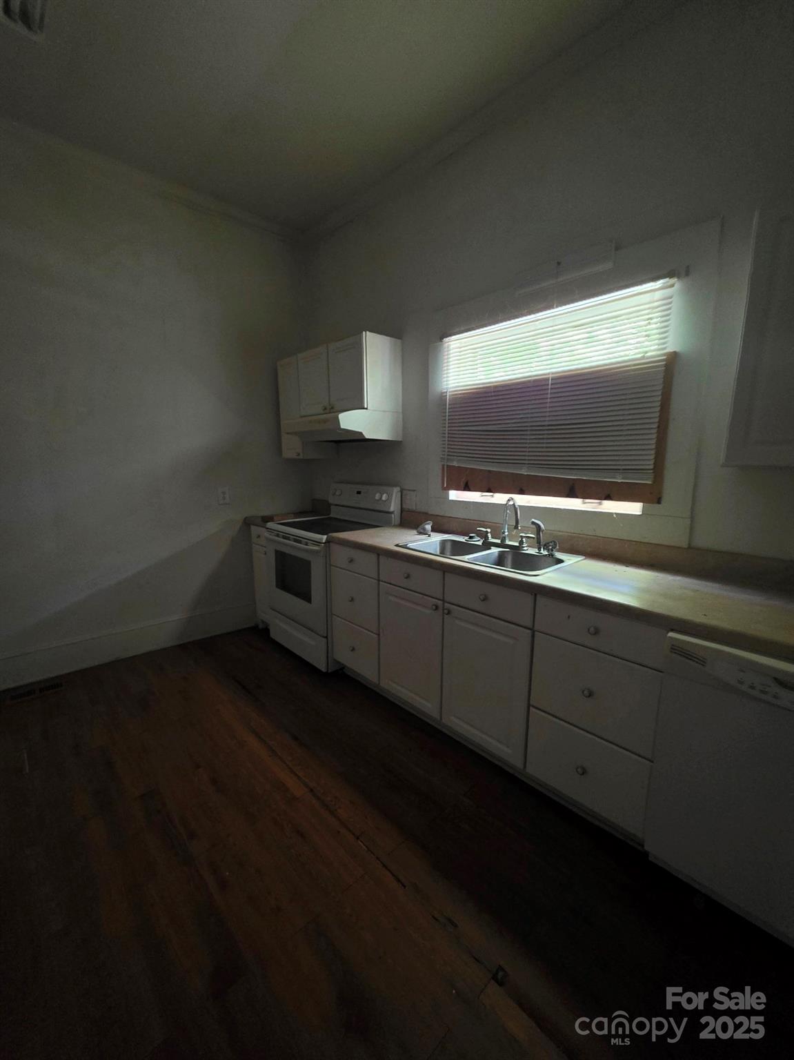 330 Plank Road Wadesboro, NC 28170 - Photo 13 of 23 a kitchen with stainless steel appliances a sink stove and cabinets