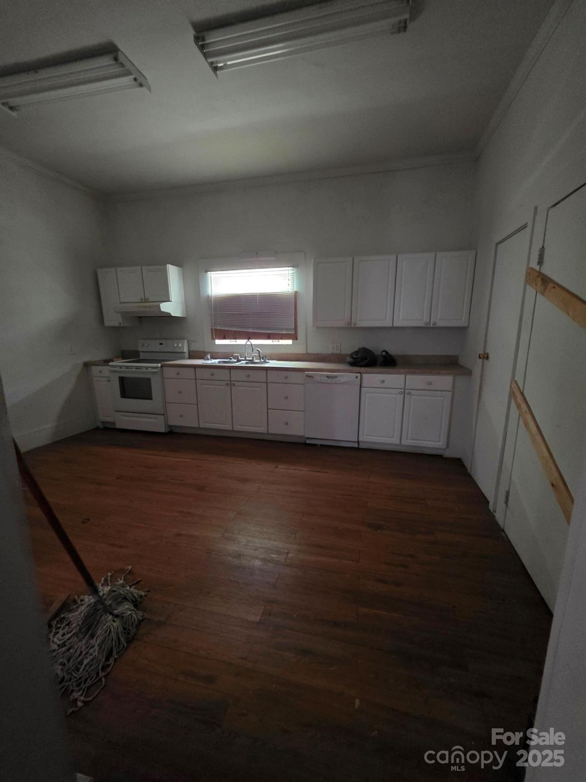 330 Plank Road Wadesboro, NC 28170 - Photo 15 of 23 a kitchen with a cabinets and window