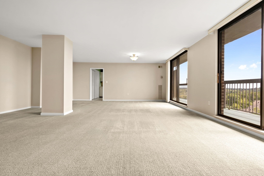 40 Village Road, Unit 1601 Middleton, MA 01949 - Photo 13 of 38 a view of an empty room with a window
