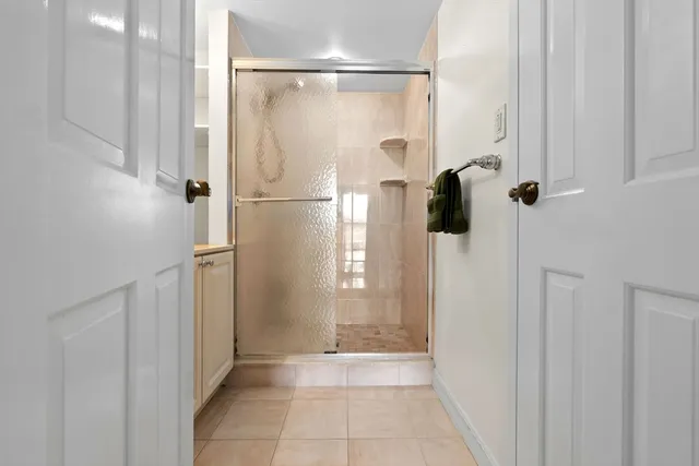 a view of an empty room with a window