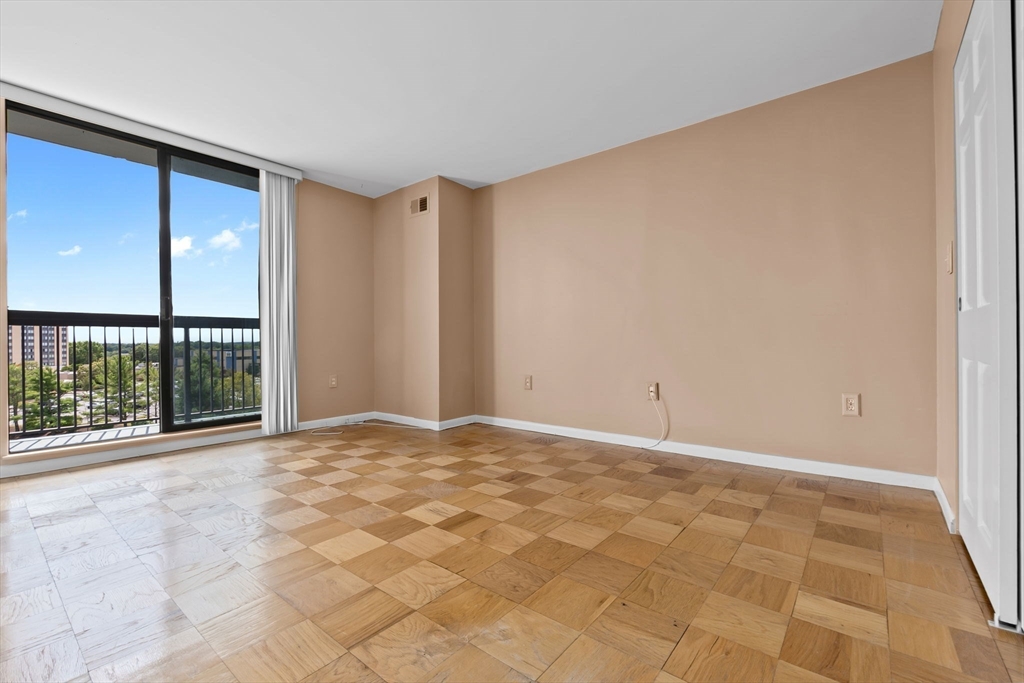 40 Village Road, Unit 1601 Middleton, MA 01949 - Photo 30 of 38 a view of an empty room with a window