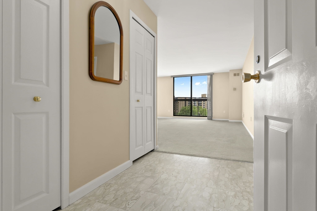 40 Village Road, Unit 1601 Middleton, MA 01949 - Photo 9 of 38 a view of a room that has a large window